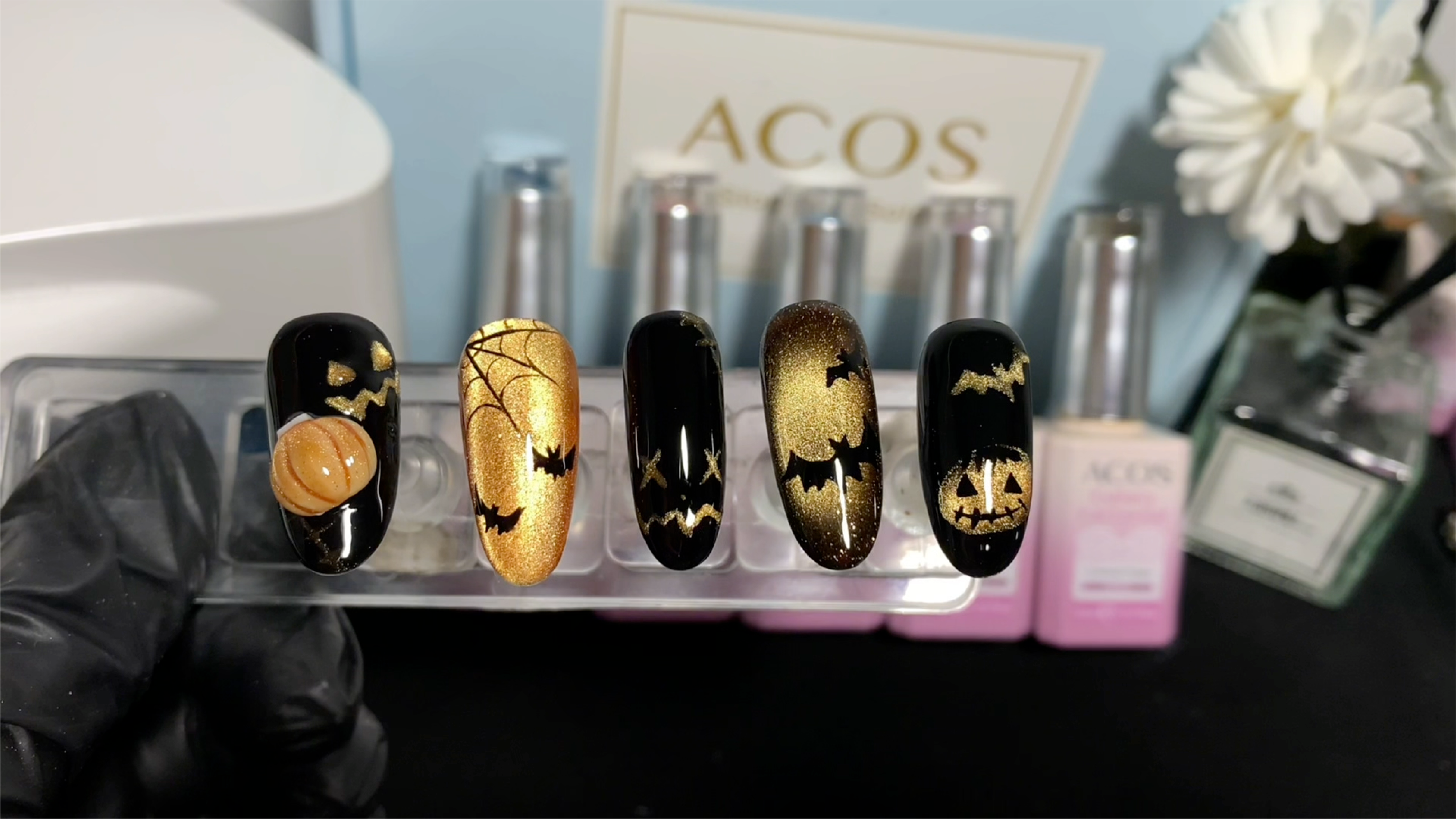 Spooky yet elegant cat eye nail designs.